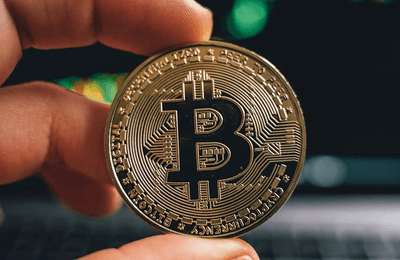 Mobile screen displaying crypto market charts
